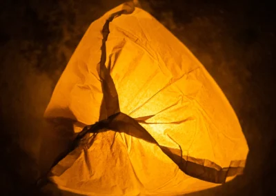 A glowing paper lantern in the dark
