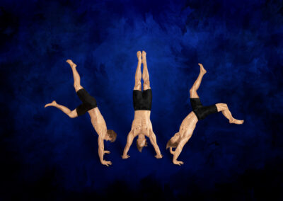 Juhani Juurik's self-portrait digital painting depicting three figures trying to find balance while handstanding